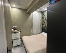 Nizami r., Qara Qarayev m.